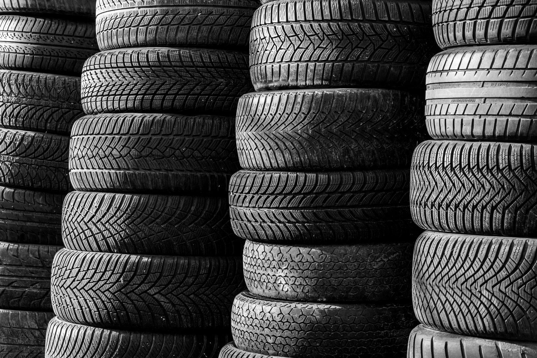 Rows of new tires at a tire shop
