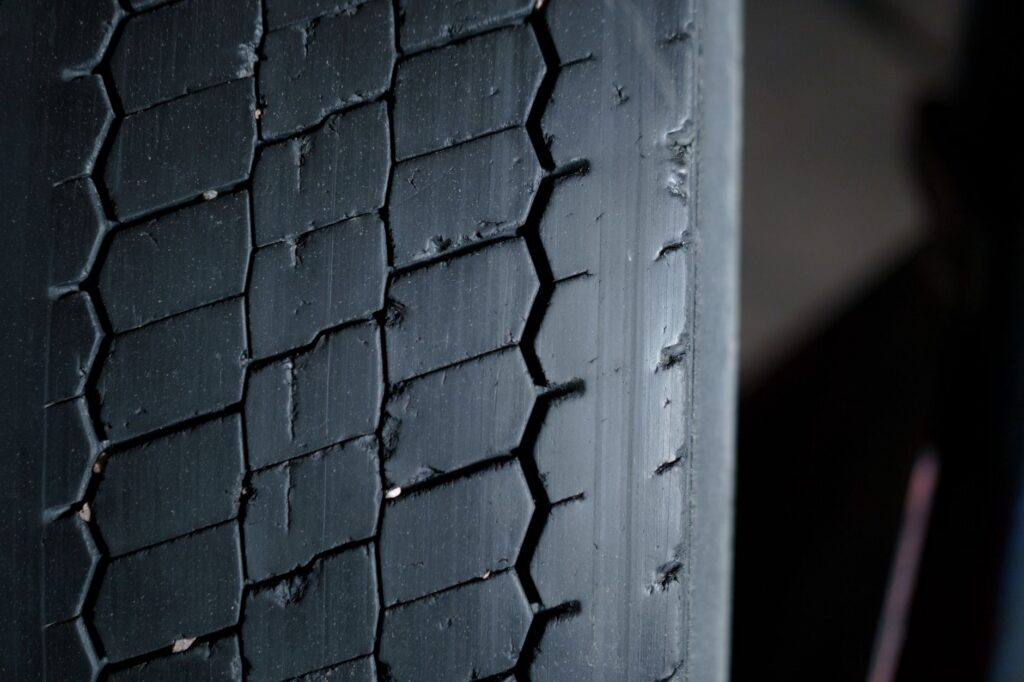 A worn car tire due for replacement