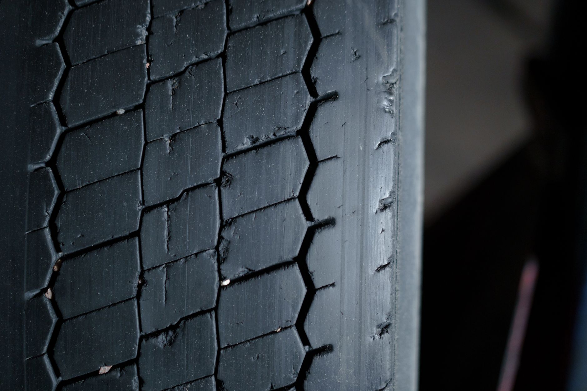 A worn car tire due for replacement